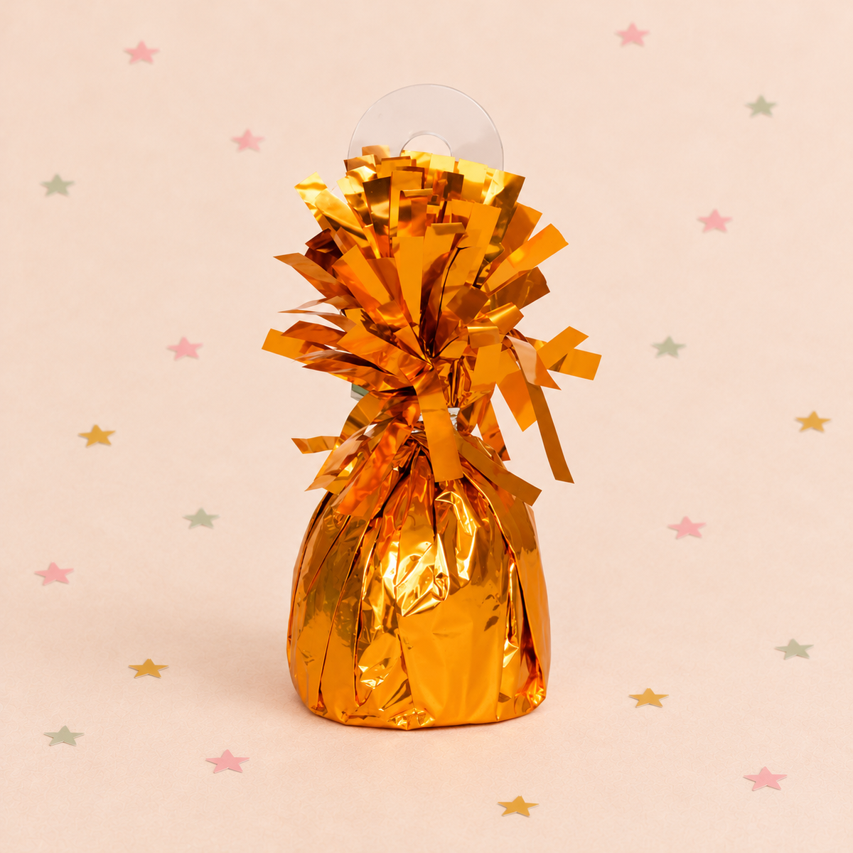 Pickit Parties orange foil balloon weight with a metallic fringed top for securing helium balloon bouquets.